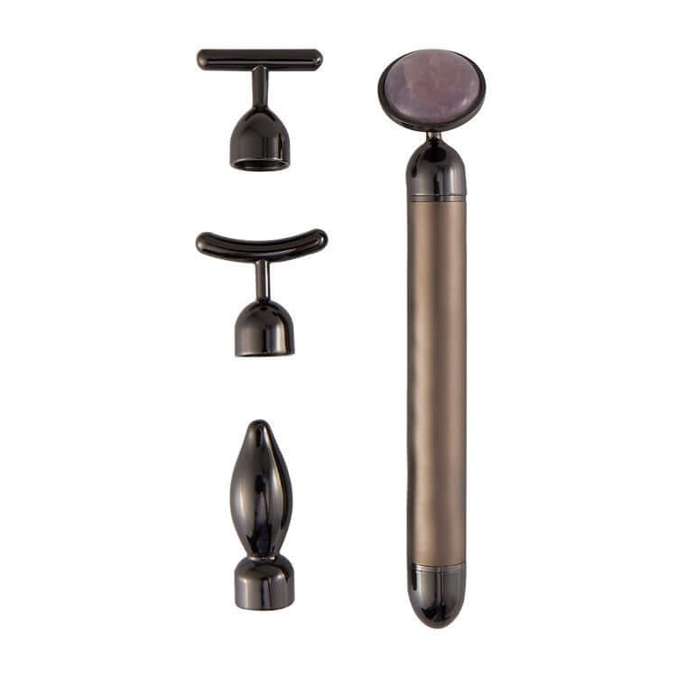 4 in 1 vibrating rose quartz face roller with multiple attachments for facial massage and skin rejuvenation.