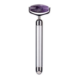 Electric jade roller with silver handle and purple stone for facial beauty and massage, enhancing skincare routine.
