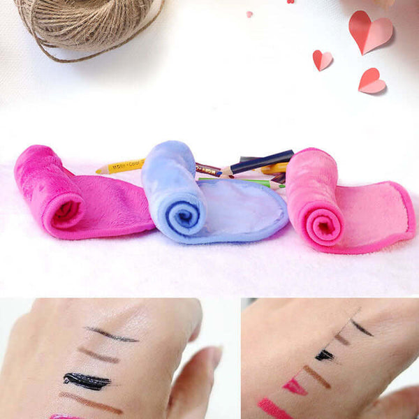 Microfiber water makeup remover towels in pink, blue, and purple, shown removing makeup on skin for easy and effective cleansing.