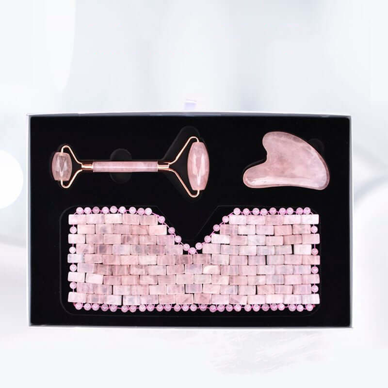 Rose Quartz Eye Mask Massager set featuring facial lift roller and wand, perfect for skincare routine and relaxation.