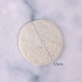 Reusable round loofah facial sponge, 5.5cm, perfect for scrubbing and exfoliating skin during makeup removal.