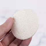 Round reusable loofah facial sponge for skincare and makeup removal, 5.8cm size, eco-friendly and exfoliating.