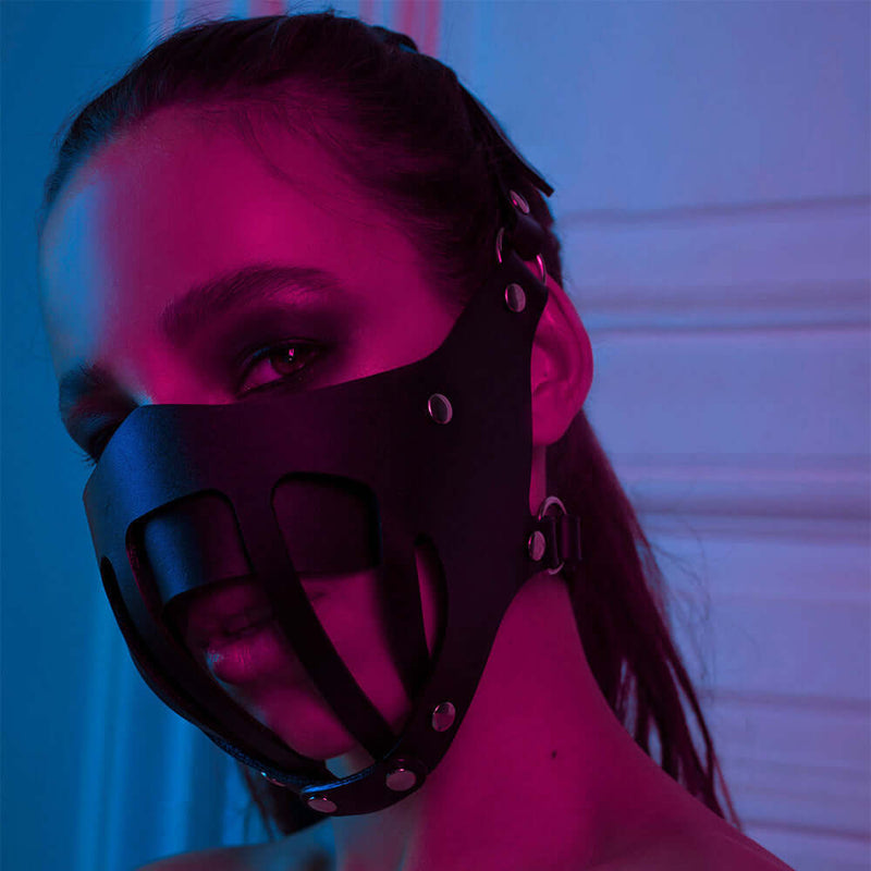 Fashionable women's sexy leather face mask in black, featuring stylish design and adjustable fit.