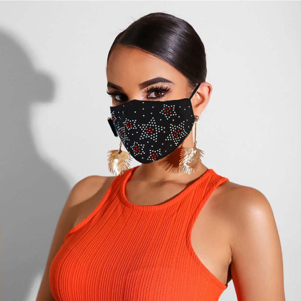 Black rhinestone jewelry mask for women, perfect for spring and summer, worn with stylish orange top and earrings.
