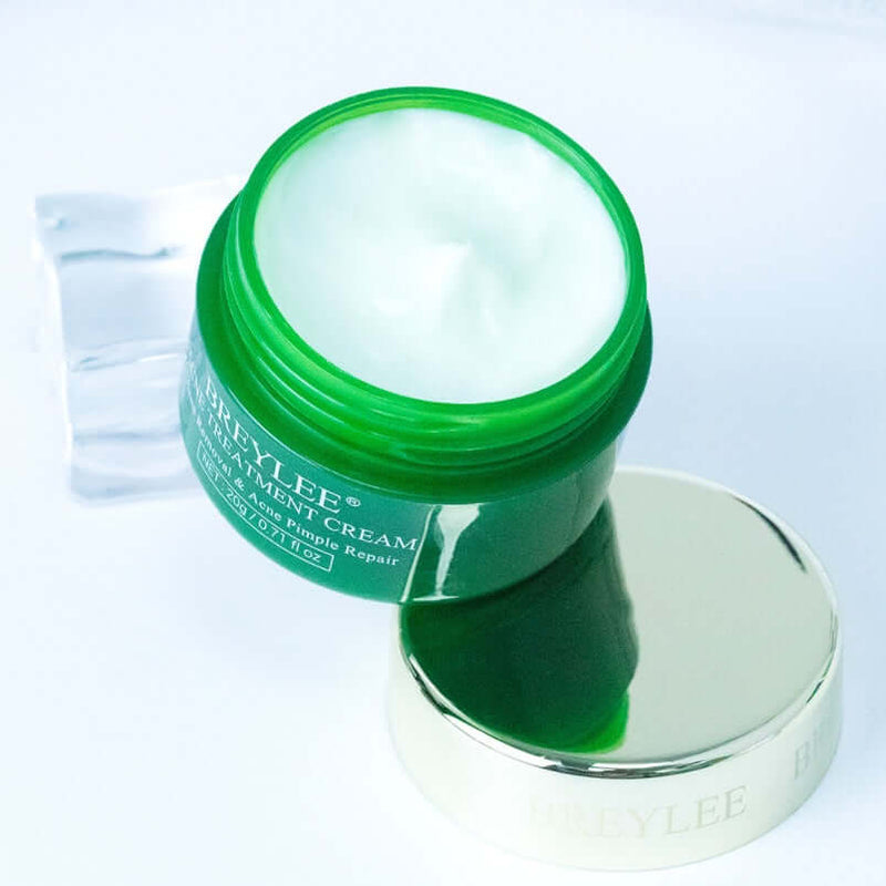 Tea tree acne cream in green jar, designed for acne removal and skin repair. Ideal for acne-prone skin.