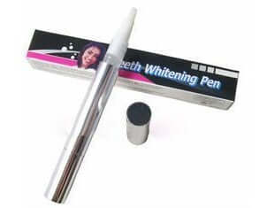 Teeth whitening pen with packaging, designed for easy, portable tooth whitening without trays.