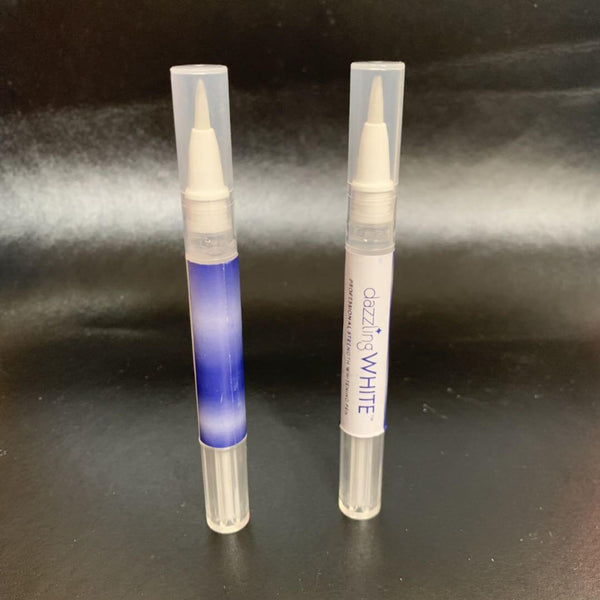 Two transparent teeth whitening pens with pointed applicators for convenient whitening gel application.