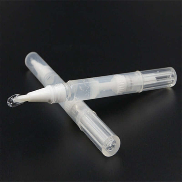 Transparent teeth whitening pen with brush applicator, ideal for effective teeth bleaching and whitening.