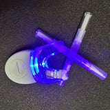 Plastic tube teeth whitening pen with LED light for effective teeth bleaching and whitening.