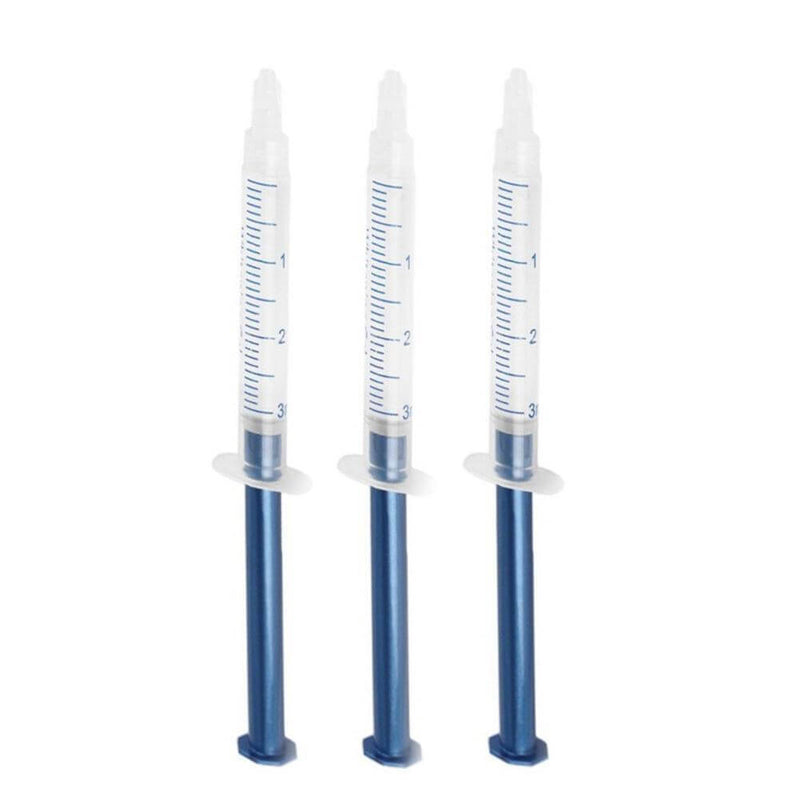 Three syringes for teeth whitening gel, ideal for achieving brighter, whiter teeth at home.